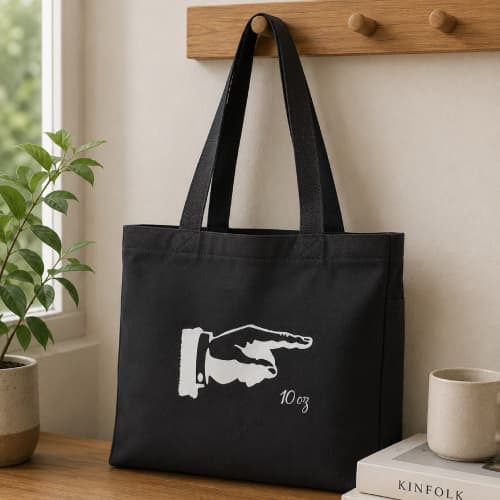 Lifestyle image of the Coloured Cranbrook Recycled Cotton Canvas Medium Tote Bags by Total Merchandise