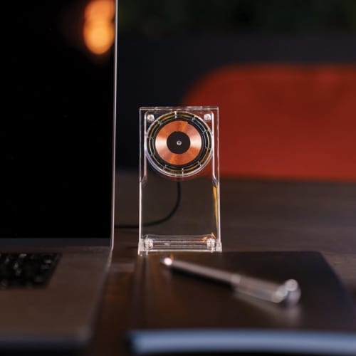 Lifestyle image of the MagSafe 15W Magnetic Wireless Charging Stand in Transparent