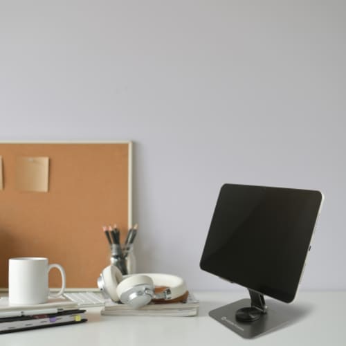 Lifestyle image of the Foldable Metal Tablet Stand with a design from Total Merchandise