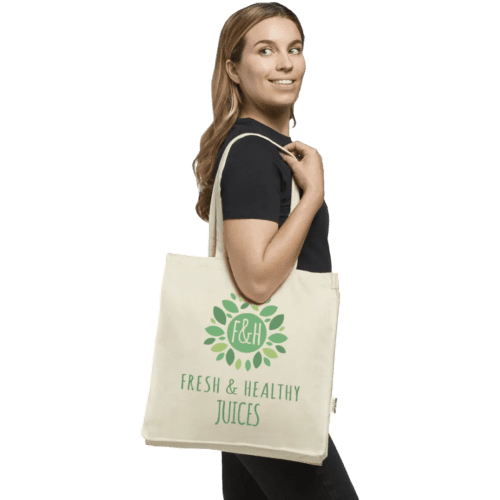 Lifestyle image of the Odessa Recycled Natural Cotton Tote Bag in Natural from Total Merchandise