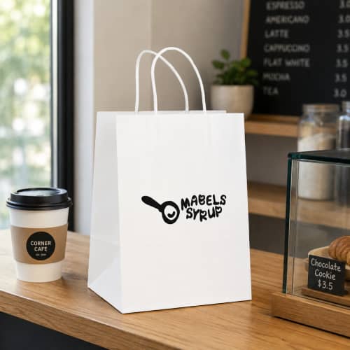 Lifestyle image of the Medium White Brunswick Paper Bag by Total Merchandise