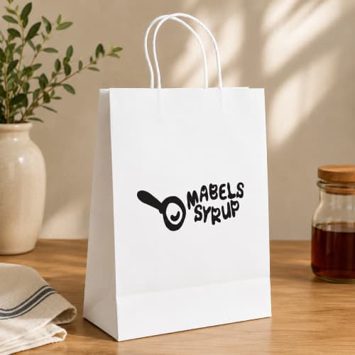 Lifestyle image of the Large White Brunswick Paper Bag by Total Merchandise