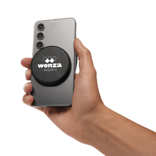 Lifestyle image of the Nova Wireless Magnetic Charger from Total Merchandise