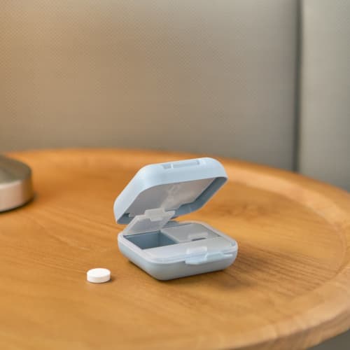 Lifestyle image of the PP Plastic Pill Box branded with your logo from Total Merchandise