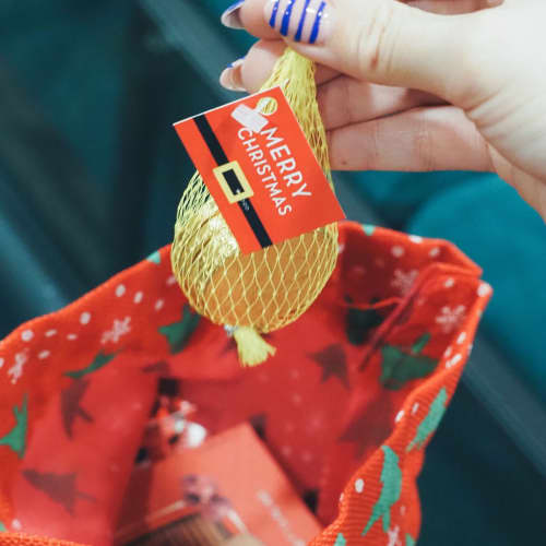 Personalisable Christmas Hamper Bags with a tag branded with your logo from Total Merchandise