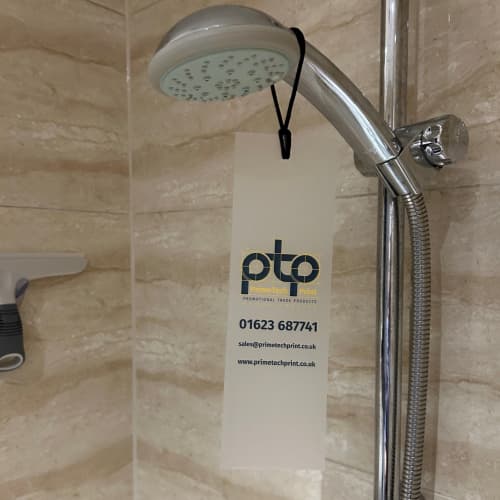 Custom Branded Hotel Door Tags in Frosted Clear branded with your logo from Total Merchandise