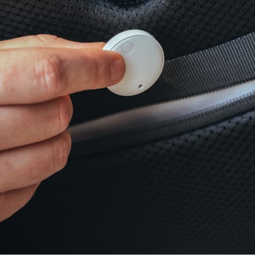 Lifestyle image of the Findmate Dual Recycled Plastic Item Finder from Total Merchandise
