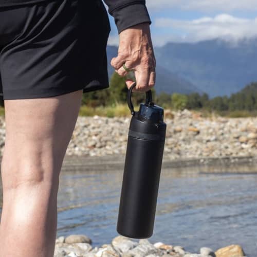 Lifestyle image of the Omni Sip Recycled Lockable Bottle from Total Merchandise