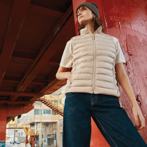 Lifestyle image of the Women's Meru Recycled Polyester Bodywarmer branded with your company logo