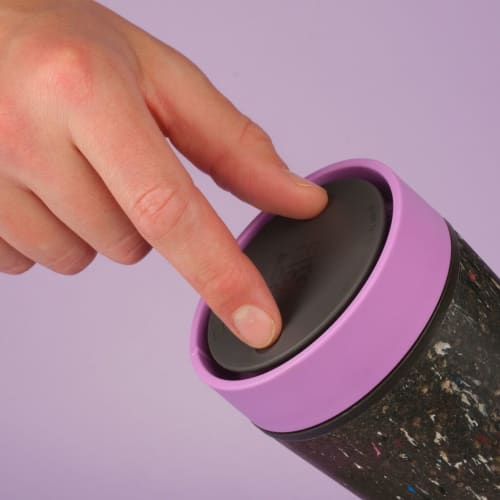 Lifestyle image of the Circular & Co. Reusable Coffee Cup Made From Recycled Trainers from Total Merchandise