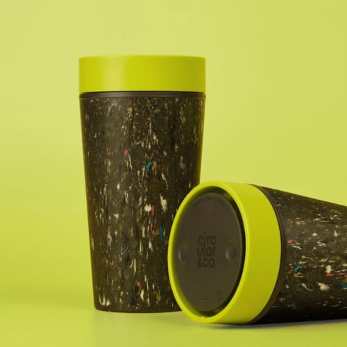 Lifestyle image of the Circular & Co. Reusable Coffee Cup Made From Recycled Trainers from Total Merchandise