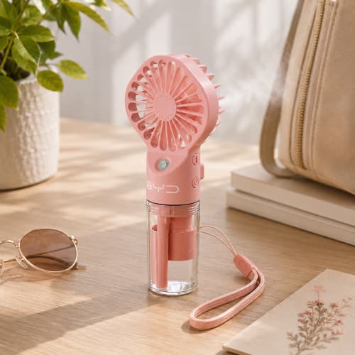 Lifestyle image of the Rechargeable Handheld Misting Fan by Total Merchandise