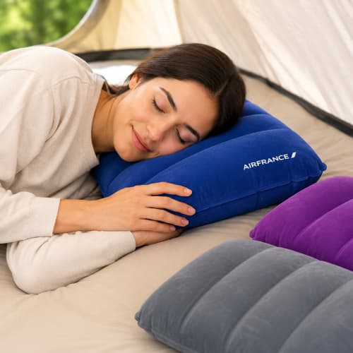 Lifestyle image of the Inflatable Travel Pillow by Total Merchandise