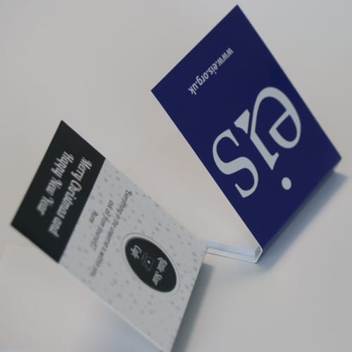 Lifestyle image of the Sticky Note Pad with Printed Cover from Total Merchandise