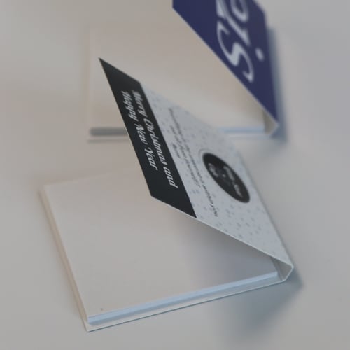 Lifestyle image of the Sticky Note Pad with Printed Cover from Total Merchandise