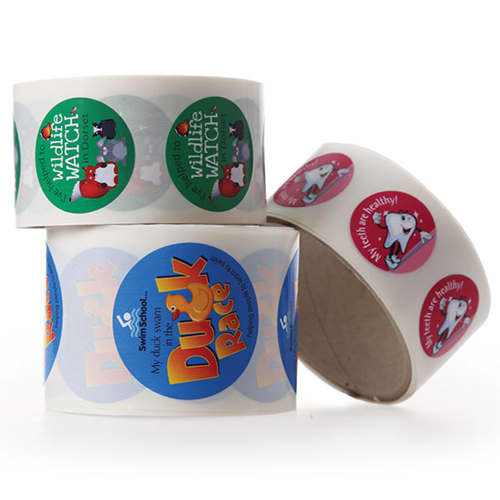 Reels of paper stickers branded with your corporate design from Total Merchandise