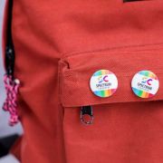 Lifestyle image of the 25mm Circle Plastic Button Badges with a design from Total Merchandise