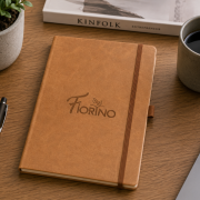 lifestyle image of the Ivory Tucson Medium Premium Notebooks by Total Merchandise