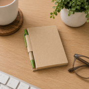 Lifestyle image of the Mini Eco Notebook and Pen Set by Total Merchandise