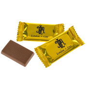 Printed Petit Chocolates in Gold packet with company logo on the front by Total Merchandise
