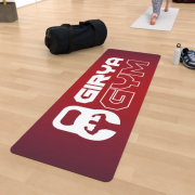 Lifestyle image of the All Over Printed Yoga Mat from Total Merchandise