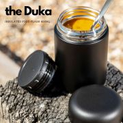 A lifestyle image of the Duka Insulated Food Flask in Black from Total Merchandise
