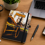 Lifestyle image of the All Over Full Colour Printed A5 Notebook by Total Merchandise