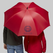 Life style image of the Logo printed 30" Golf Umbrella with Foam Handle by Total Merchandise