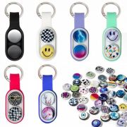 Variety of different colours of the Fidget Flipper Keyring available together from Total Merchandise