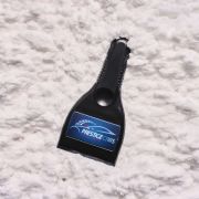 Custom Printed Essential Recycled Plastic Ice Scrapers in Snowy Background from Total Merchandise