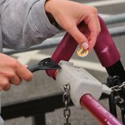 Image of Printed Eco Trolley Coin Ice Scraper Keyring Being Used in a Trolley by Total Merchandise