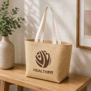 Lifestyle image of the XL Natural Jute Tote Bag by Total Merchandise
