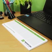 Lifestyle images of the Laptop Notepad with a printed design from Total Merchandise