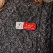 Lifestyle image of the Recycled Plastic Slim Rectangle Name Badge from Total Merchandise
