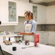 Lifestyle image of the Chilli Cotton Apron from Total Merchandise