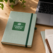 Lifestyle image of the A5 Ocean Waste Notebook by Total Merchandise