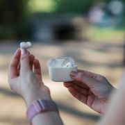 Lifestyle image of the RCS Recycled Plastic Liberty Pro Wireless Earbuds from Total Merchandise