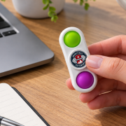 Lifestyle image of the Pop It Fidget Double Spinner Customised by Total Merchandise