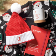 Lifestyle image of the Knitted Christmas Beanie branded by Total Merchandise