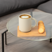Lifestyle image of the 325ml Ceramic Mug & Bamboo Board Set from Total Merchandise