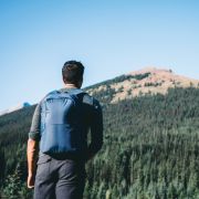 Lifestyle image of the Impact AWARE™ RPET Anti-Theft Backpack from Total Merchandise