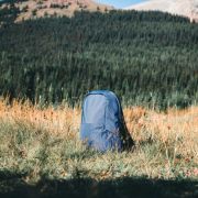 Lifestyle image of the Impact AWARE™ RPET Anti-Theft Backpack from Total Merchandise