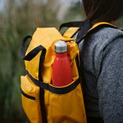 Lifestyle image of the 21L rPET Wellington Backpacks from the Total Merchandise