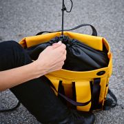 Lifestyle image of the 21L rPET Wellington Backpacks from the Total Merchandise