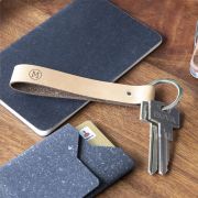 Lifestyle image of the Recycled Leather Keyrings with a design from Total Merchandise