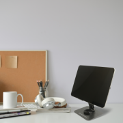 Lifestyle image of the Foldable Metal Tablet Stand with a design from Total Merchandise