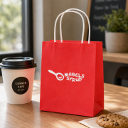 Lifestyle image of the Small Coloured Brunswick Paper Bag by Total Merchandise