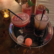 Tray of Drinks with Anti Spiking Drink Protectors Printed with a Logo by Total Merchandise
