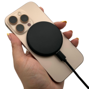 Lifestyle image of the Nova Wireless Magnetic Charger from Total Merchandise