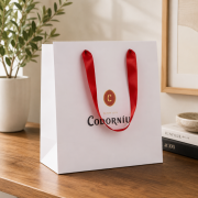 Lifestyle image of the A4 Antalya Satin Ribbon Gift Bag by Total Merchandise